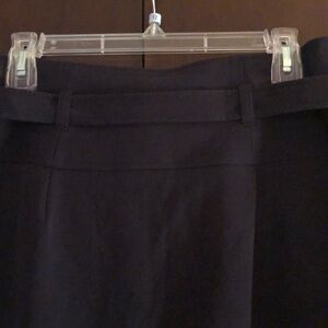NAVY blue skirt with belt.  Side zipper and button